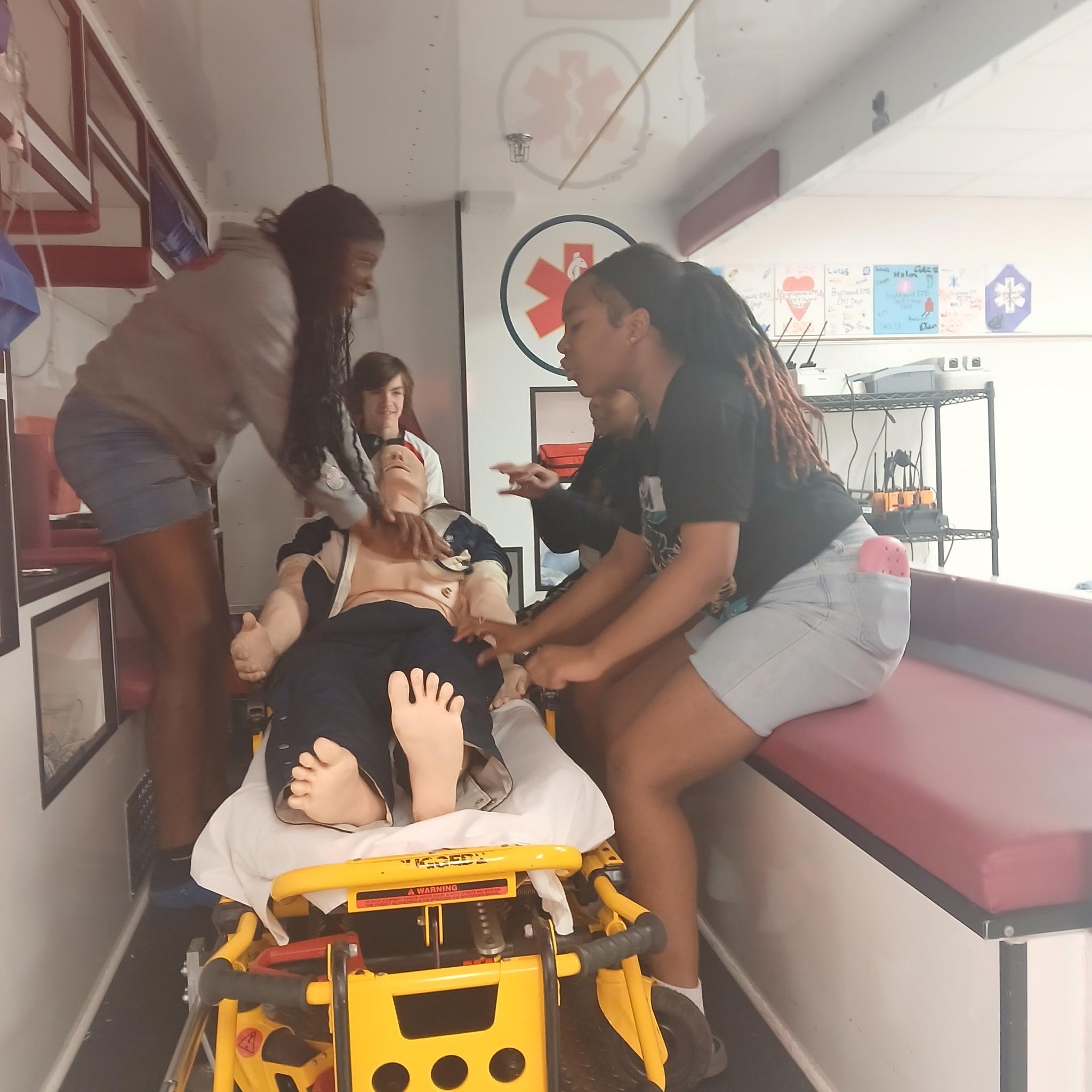 Vernon Johns eighth graders practicing CPR during the Builders Hub summer program
