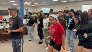 Woodrow Wilson Middle School students learning Latin dances with Salsa Noke guest speaker