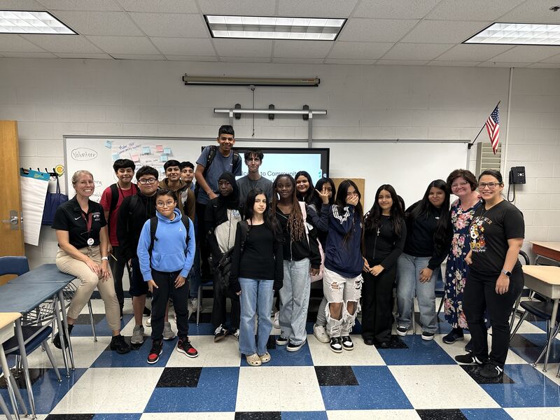 Latinas Network visiting John Fishwick Middle School students in a classroom session