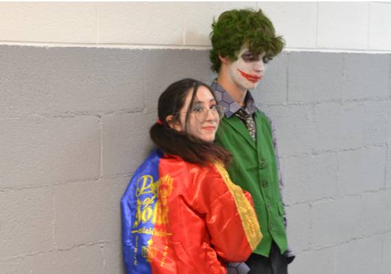 Students receiving a Halloween attendance reward