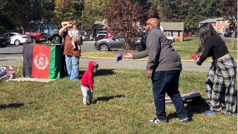 Families attending a community picnic at Quioccasin Middle School