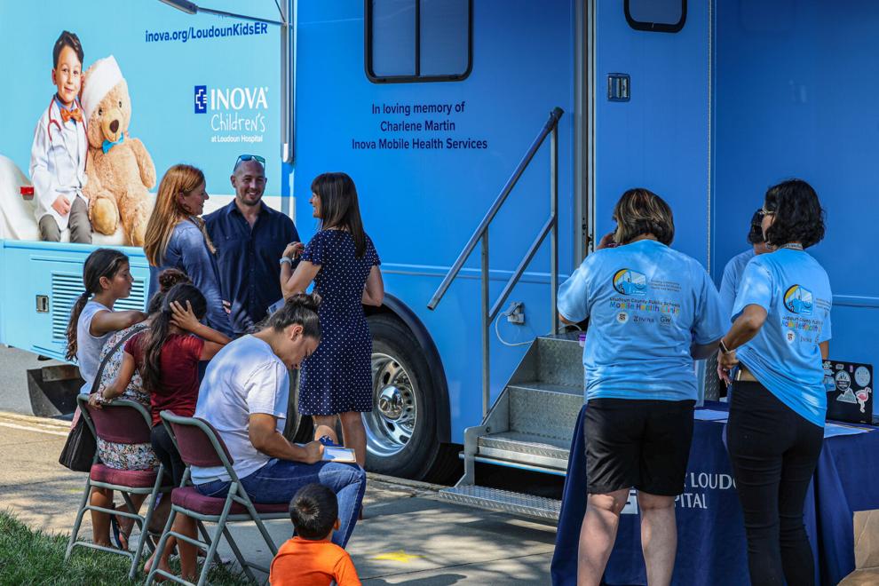 Families attending the mobile health clinic event at a Loudoun County school