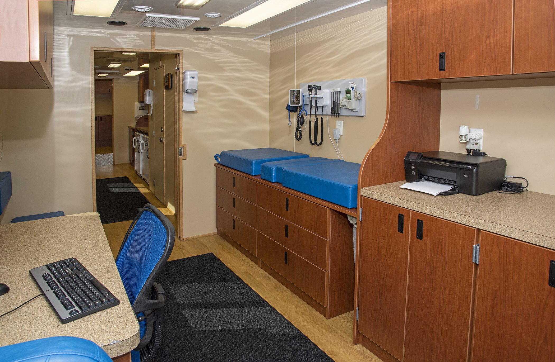 Fully equipped exam room inside the Loudoun County mobile health clinic bus