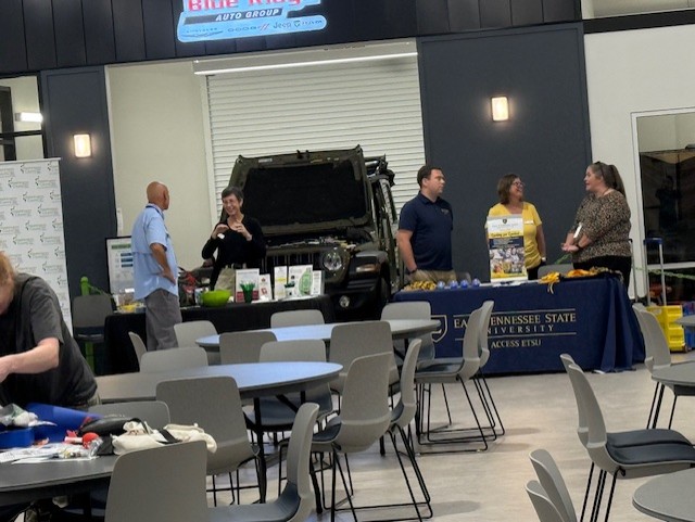Family Resource Center kickoff event setup inside a showroom