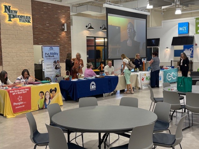 Community partner tables at the Abingdon High School Family Resource Center kickoff