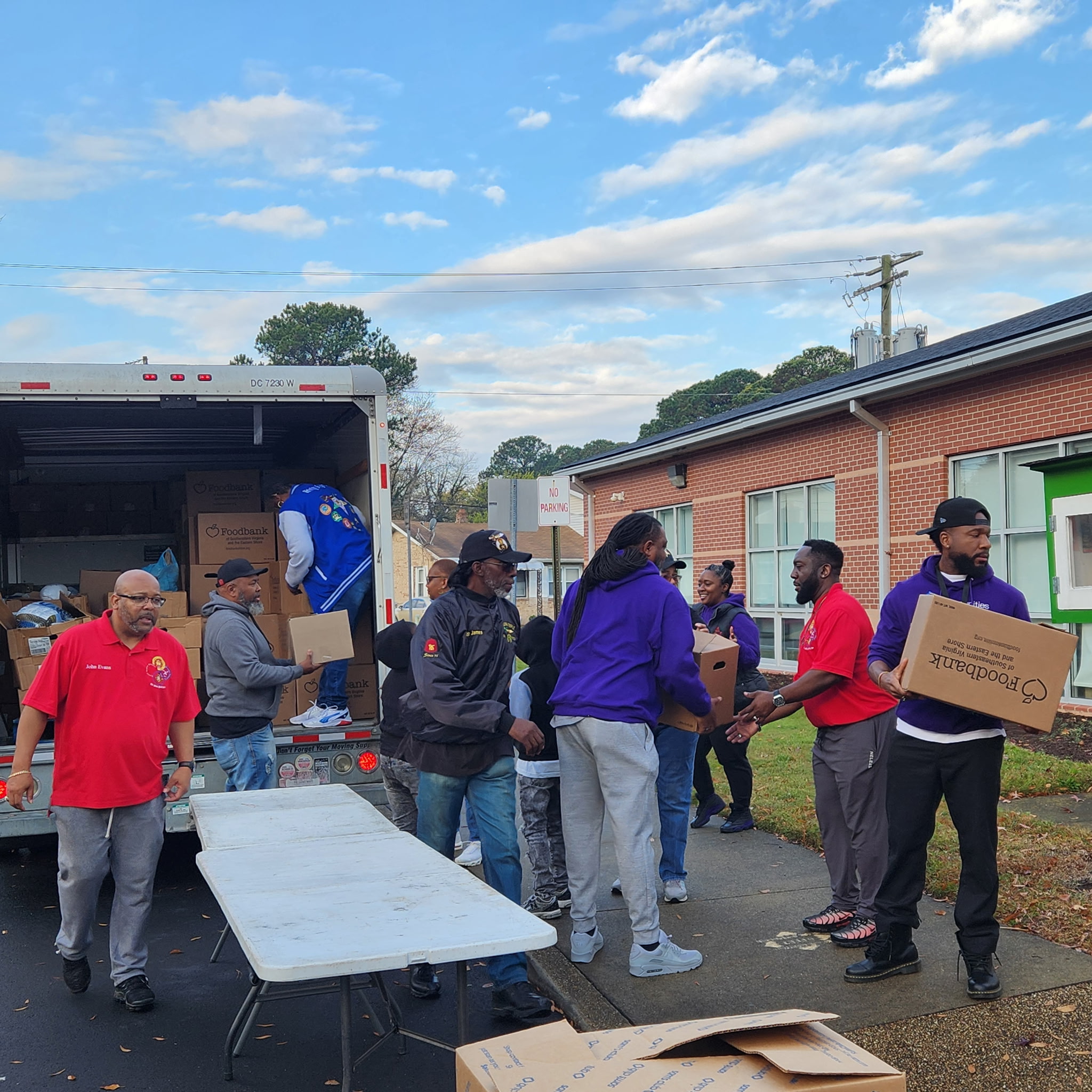 Foodbank truck being unloaded at Douglas Park Elementary, Portsmouth City