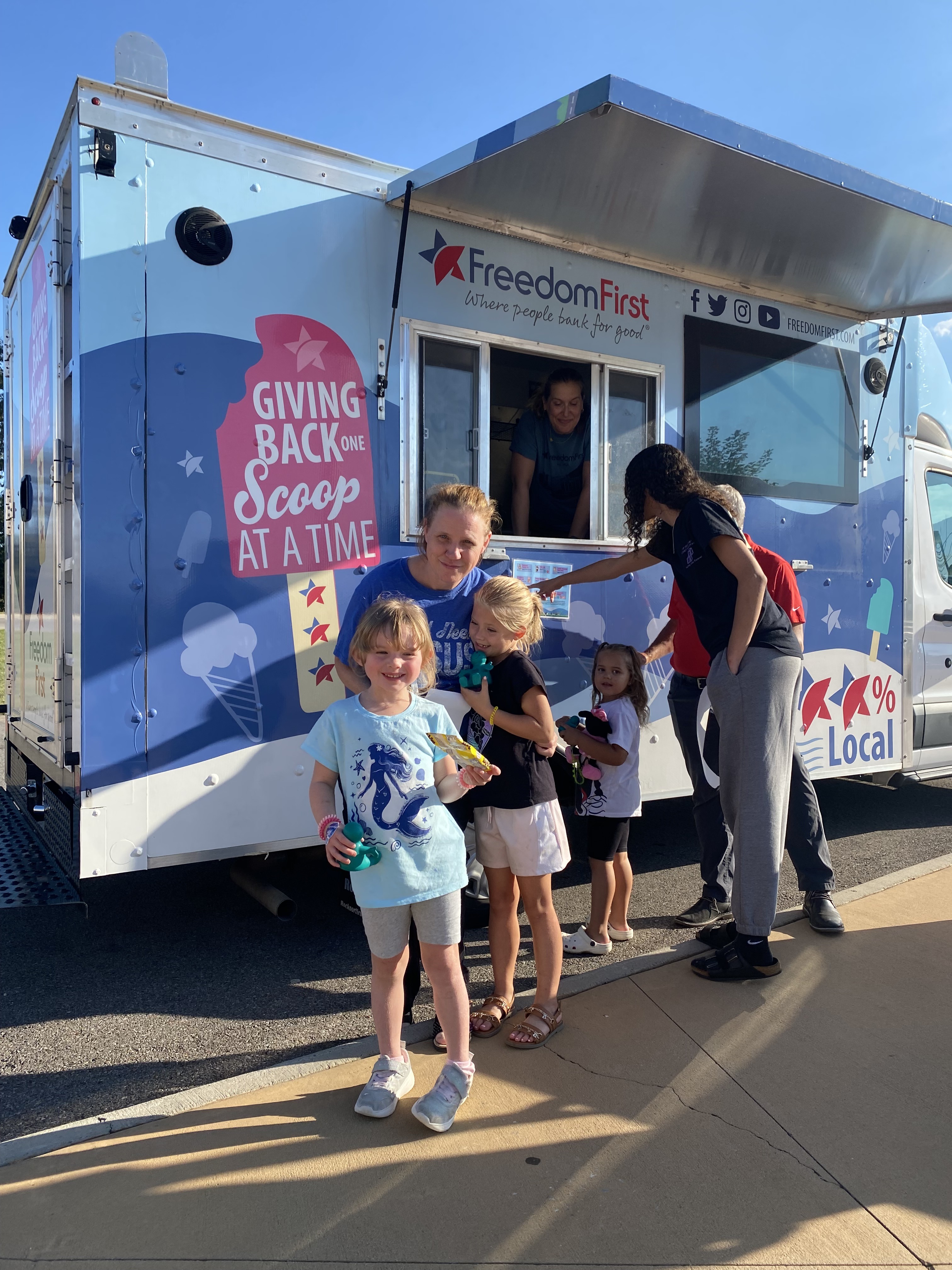 Freedom First Credit Union ice cream truck at a LIFT Center family event, Fallon Park Elementary